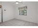 A cozy breakfast nook bathed in natural light and ceiling fan at 13643 Pimberton Dr, Hudson, FL 34669