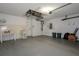 Clean garage space with utility sink and plenty of storage at 13643 Pimberton Dr, Hudson, FL 34669