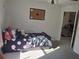 bedroom with a large window allowing for plenty of natural light at 18336 Macek Rd, Weeki Wachee, FL 34614