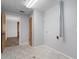 The laundry room has tile floors and convenient hookups at 19019 3Rd Ne St, Lutz, FL 33549