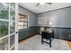 Stylish office features a neutral color palette and hardwood floors, creating an ideal workspace at 19019 3Rd Ne St, Lutz, FL 33549