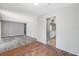Spacious living room features hard surface flooring and a brick accent area at 2608 W Fletcher Ave, Tampa, FL 33618