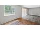 Living room featuring a large window with natural light at 2608 W Fletcher Ave, Tampa, FL 33618