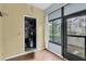 Sunroom Closet with golf clubs and shelving for organized storage at 3590 Magnolia Ridge Cir # 1103-C, Palm Harbor, FL 34684