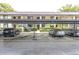Exterior view of covered parking in front of residences at 3590 Magnolia Ridge Cir # 1103-C, Palm Harbor, FL 34684