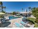 Expansive backyard with pool, patio, green space and serene landscaping at 3616 Harborview Ct, New Port Richey, FL 34652