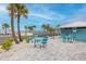 Gulf Harbors Beach Club features outdoor seating and shade, perfect for unwinding by the beachside with ocean breezes at 3616 Harborview Ct, New Port Richey, FL 34652