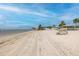 Expansive sandy beach offers serene ocean views and tranquil vibes, perfect for relaxation and recreation at 3616 Harborview Ct, New Port Richey, FL 34652