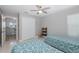 Bedroom featuring twin beds and access to office space at 3616 Harborview Ct, New Port Richey, FL 34652