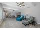 Open living room with natural light includes wood-look floors and decorative furniture at 3616 Harborview Ct, New Port Richey, FL 34652