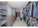 Organized walk-in closet featuring custom shelves, drawers, and plenty of storage space at 3616 Harborview Ct, New Port Richey, FL 34652