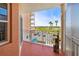 Balcony view showing parking and pond at 4516 Seagull Dr # 408, New Port Richey, FL 34652