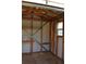 The interior of a workshop or shed with storage at 4938 Azalea Dr, New Port Richey, FL 34652