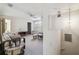 Second floor bonus room featuring an open floor plan, built-in seating, and natural light at 6518 Remus Dr, New Port Richey, FL 34653