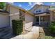 Charming two-story home with brick accents, a well-maintained lawn, and a welcoming front porch area for relaxing at 6518 Remus Dr, New Port Richey, FL 34653