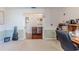 View of an office/bedroom showing light walls, carpeted floors, and an open doorway at 9131 Rhett Ln, Weeki Wachee, FL 34613