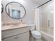 Bathroom featuring a vanity, toilet and bathtub at 9144 Bassett Ln, New Port Richey, FL 34655