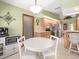 Charming breakfast nook adjacent to the kitchen, featuring a window to the backyard at 9630 Southern Belle Dr, Weeki Wachee, FL 34613