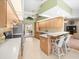 Bright kitchen boasts wooden cabinets, a breakfast bar, and an open layout at 9630 Southern Belle Dr, Weeki Wachee, FL 34613