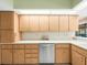 Well-maintained kitchen with wooden cabinets, modern appliances and ample counter space at 9630 Southern Belle Dr, Weeki Wachee, FL 34613