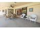 Serene outdoor patio with seating area, ideal for relaxing and enjoying the pleasant weather at 9630 Southern Belle Dr, Weeki Wachee, FL 34613