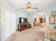 Comfortable living space with adjacent bedroom, offering ample room for relaxation at 9630 Southern Belle Dr, Weeki Wachee, FL 34613