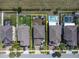 Aerial view showcasing the property's backyard, bordered in yellow, and adjacent to a pool at 11895 Crestridge Loop, New Port Richey, FL 34655