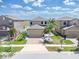 Charming home with a well-maintained lawn, landscaped with appealing trees and shrubs at 11895 Crestridge Loop, New Port Richey, FL 34655
