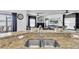 Granite countertop island in the kitchen, facing the living room at 11895 Crestridge Loop, New Port Richey, FL 34655