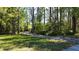 Scenic walking trail through a lush green forest, perfect for nature lovers at 12403 Coralbean Ct, New Port Richey, FL 34654