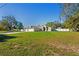 Charming home with great curb appeal and a lush green lawn is move-in ready at 13045 Marbled Godwit Rd, Weeki Wachee, FL 34614