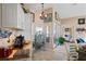 View of the kitchen featuring tile floors, a wine rack and a coffee station at 13045 Marbled Godwit Rd, Weeki Wachee, FL 34614
