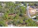 Aerial view of land with mature trees and vegetation in a serene location at 13045 Marbled Godwit Rd, Weeki Wachee, FL 34614
