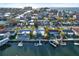 Waterfront homes with private docks along the canal, with ocean view in distance at 13906 Barnard Ave, Hudson, FL 34667