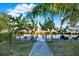 Backyard features a stone path leading to a private dock on the waterfront at 13906 Barnard Ave, Hudson, FL 34667