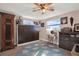 Functional bedroom featuring a Murphy bed, complemented by a desk and ample storage at 13906 Barnard Ave, Hudson, FL 34667
