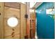 Outdoor shower with wood features and nautical accents, perfect for rinsing off after water activities at 13906 Barnard Ave, Hudson, FL 34667