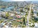 Aerial view of the home highlighting the large backyard and waterfront location with a dock at 13930 Berkowitz Ave, Hudson, FL 34667
