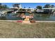 Waterfront property featuring a private boat dock and canal access for boating and recreation at 13930 Berkowitz Ave, Hudson, FL 34667