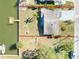 Aerial view of a home featuring waterfront property with private dock and lush green lawn at 13930 Berkowitz Ave, Hudson, FL 34667