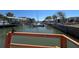Scenic view of the canal with boats docked, showcasing waterfront living and property access at 13930 Berkowitz Ave, Hudson, FL 34667