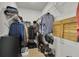 Organized walk-in closet with wire shelving, clothes racks, and shoe storage, maximizing space at 1436 Gopher Loop, Tarpon Springs, FL 34689