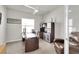 Well-lit office space with a desk, storage, and leather reclining chair at 1436 Gopher Loop, Tarpon Springs, FL 34689
