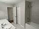 Well-lit bathroom with tile flooring, tub, and shower combination at 1713 Walden Ct, Englewood, FL 34224