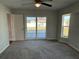 Bedroom with a fan and plenty of natural light at 1713 Walden Ct, Englewood, FL 34224