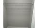 A simple walk-in closet at 1713 Walden Ct, Englewood, FL 34224