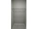 A simple walk-in closet with one shelf at 1713 Walden Ct, Englewood, FL 34224