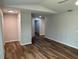 Living room with hardwood floor and gray colored walls at 1713 Walden Ct, Englewood, FL 34224