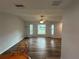 Living room with large windows providing ample natural light at 1713 Walden Ct, Englewood, FL 34224