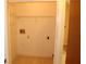 Utility room with closet shelving and washer/dryer hookups at 2568 W Brook Ln, Clearwater, FL 33761
